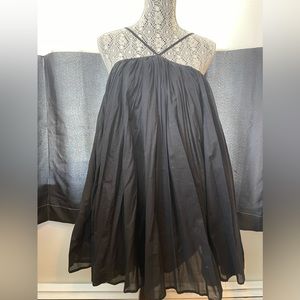 NEW WITH TAGS. Halter style black mini dress